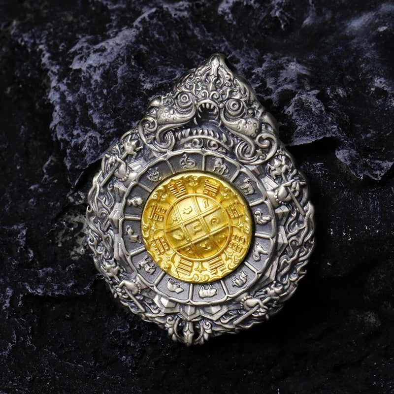 Buddhist rotating Bagua pendant in silver, meaningful jewelry art for daily wear and protection.