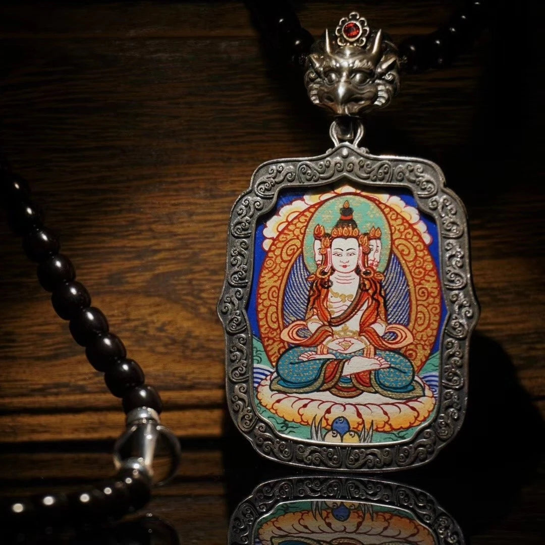 Sacred Regong Thangka Buddhist pendant symbolizing protection and blessings, Tibetan Buddhist jewelry culture art.