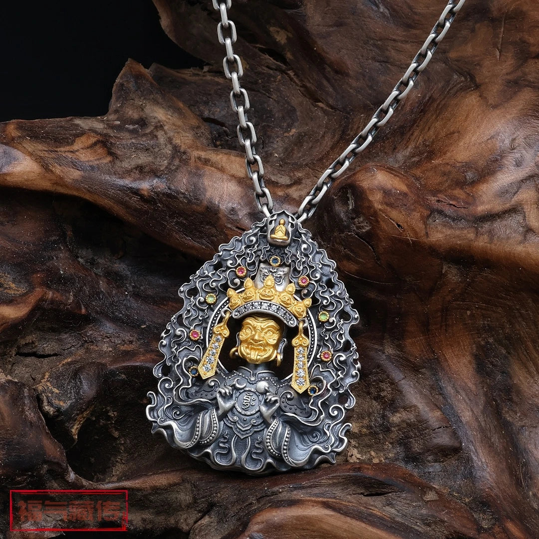Silver rotating Zaki Lhamo pendant representing karma and spiritual transformation in Tibetan Buddhist jewelry culture.