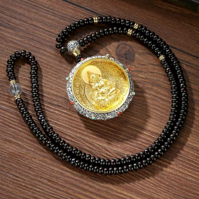 Handcrafted silver Buddhist zodiac amulet pendant inspired by Tibetan Buddhist jewelry culture and sacred symbolism.