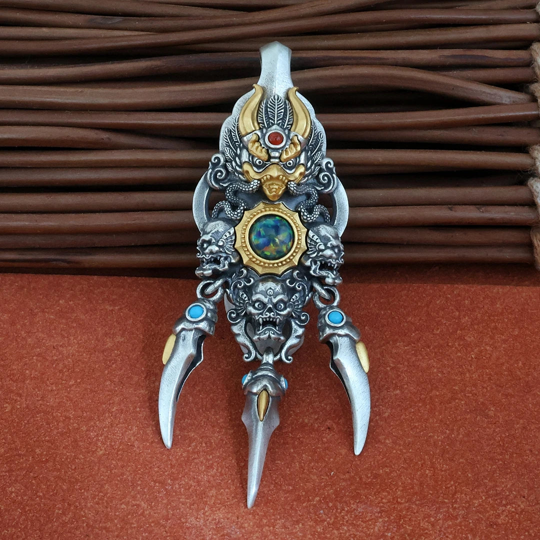 Tibetan Garuda spinning pendant necklace representing courage, movement, and inner strength