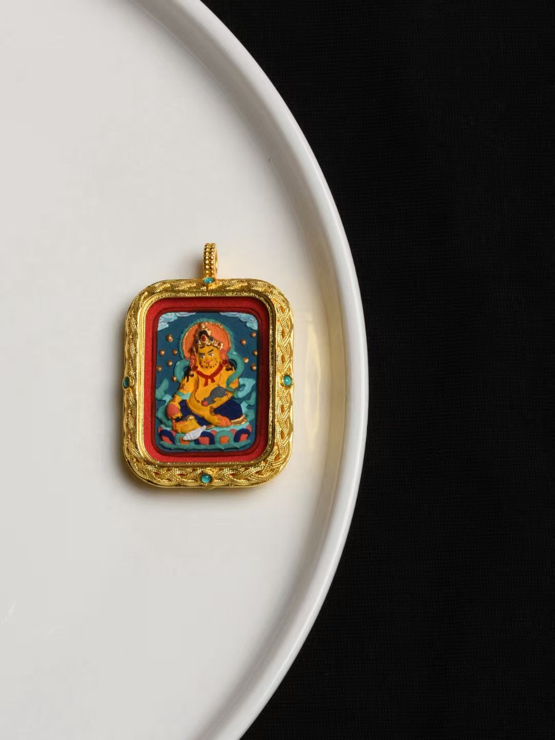 Spiritual Yellow Jambhala thangka pendant inspired by Tibetan Buddhist jewelry culture, meaningful jewelry art.