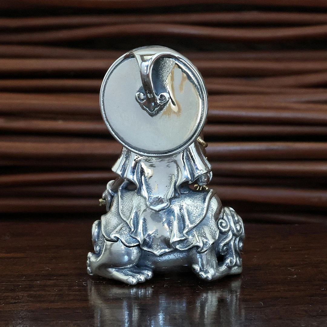 Handmade Zaki Lhamo thangka pendant reflecting Tibetan Buddhist jewelry culture and devotion.