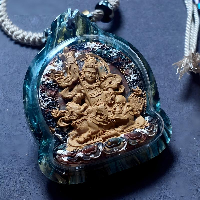 Tibetan Buddhist Jewelry Culture handmade Tibetan Gawu box necklace featuring Jambhala Wealth Deity Tsa Tsa, traditional Tibetan Buddhist jewelry art