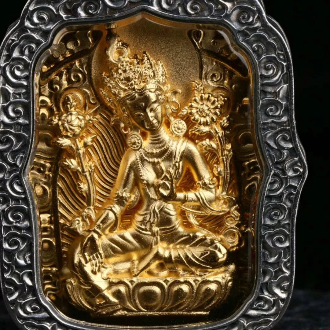 Tibetan Yellow Jambhala silver pendant, handcrafted Buddhist jewelry art symbolizing abundance and good luck.