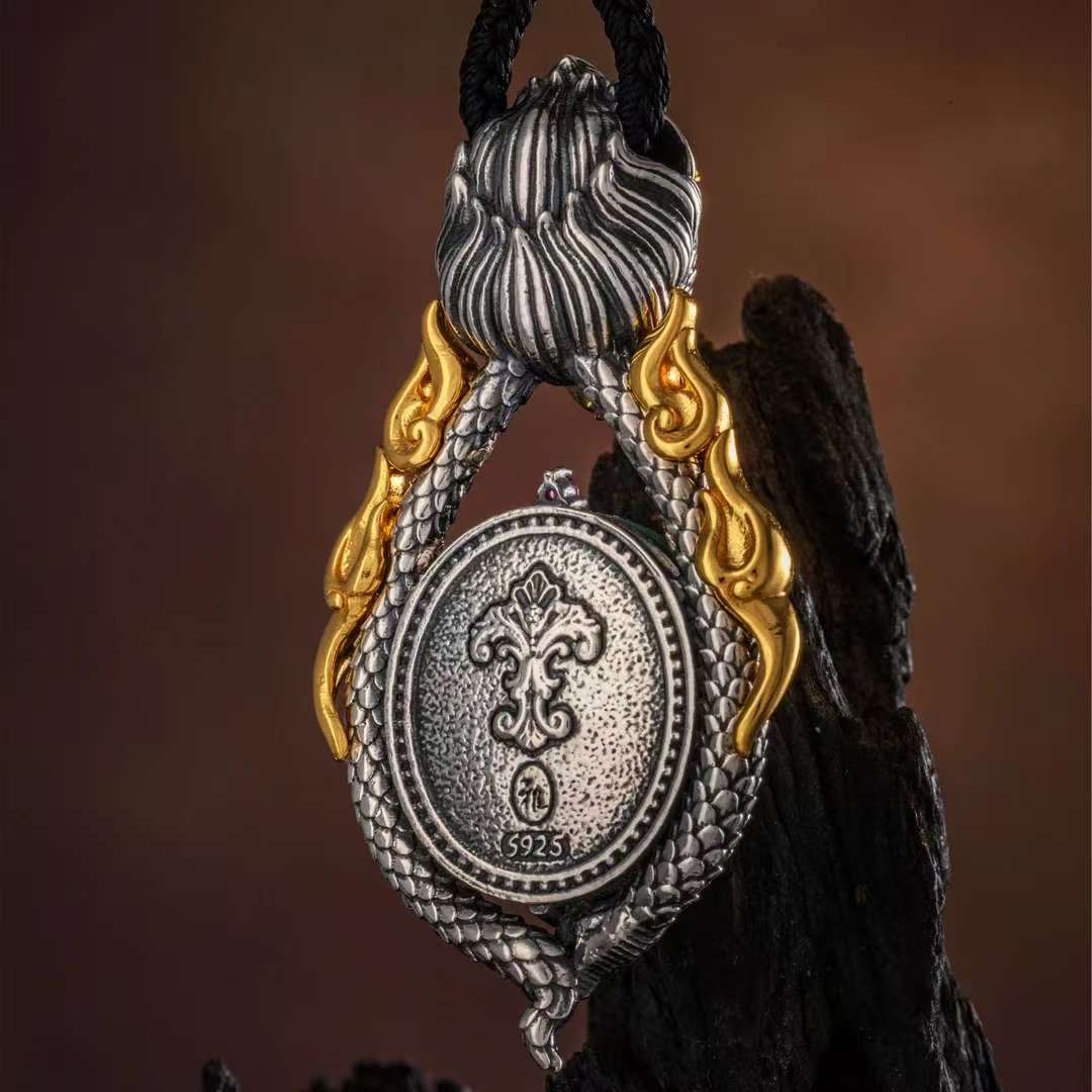 Traditional Garuda bird silver pendant inspired by Tibetan Buddhist jewelry culture and handcrafted jewelry art.