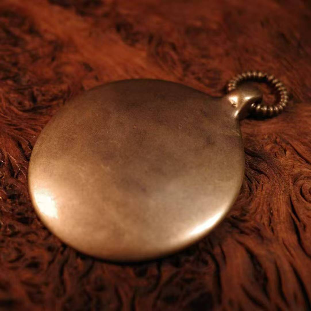 Traditional Tibetan Bagua pendant crafted as jewelry art, symbolizing protection, order, and spiritual harmony.