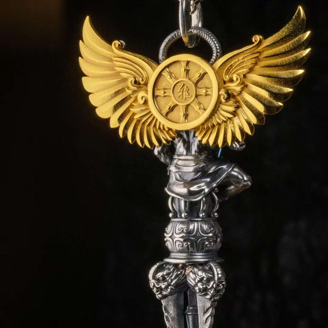 Handcrafted silver Garuda vajra pendant inspired by Tibetan Buddhist jewelry culture, meaningful spiritual jewelry art.