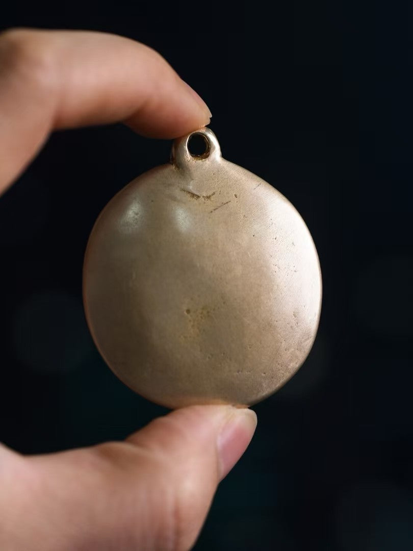 Spiritual Nine Palace Bagua talisman pendant inspired by Tibetan Buddhist jewelry culture.