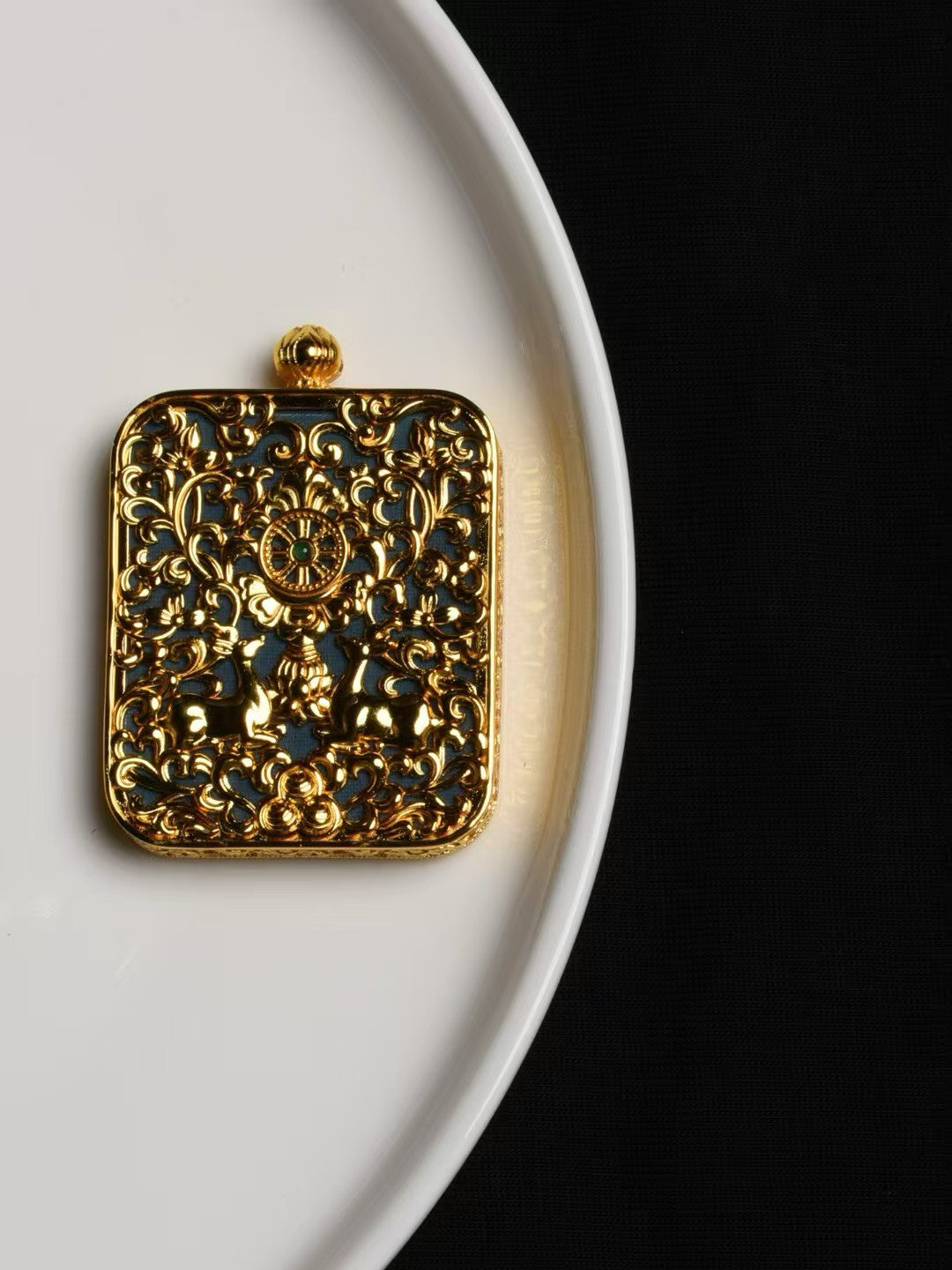 Spiritual Yellow Jambhala Buddhist pendant, handcrafted jewelry art inspired by Tibetan Buddhist culture.