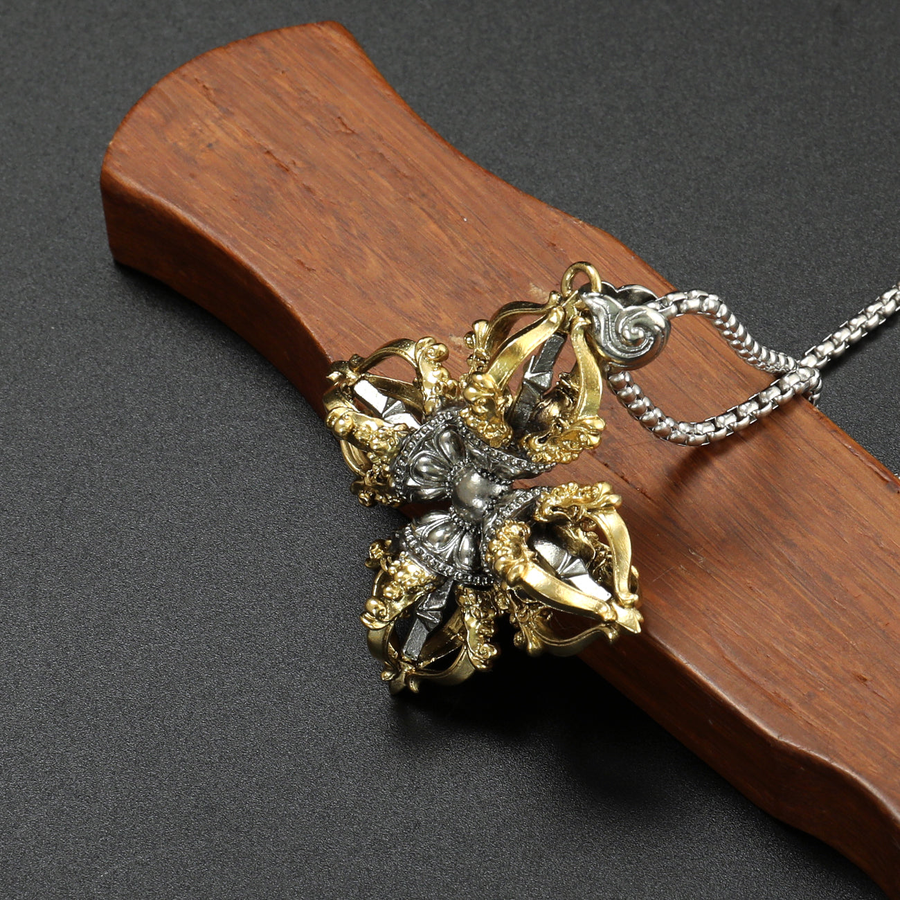 Tibetan Buddhist Capricorn Cross Vajra pendant in brass and white copper, hand-painted with spiritual artistry, reflecting strength and wisdom