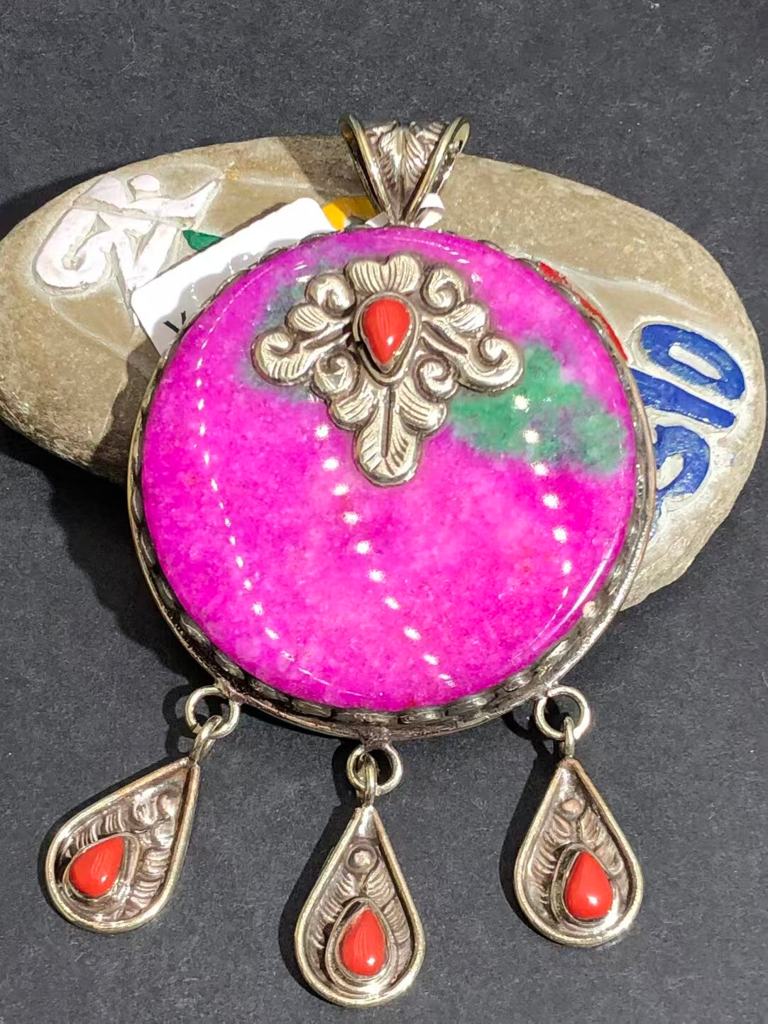 Handmade Malaysian jade round pendant infused with Tibetan Buddhist symbolism. Enhances meditation, promotes harmony, and offers spiritual protection.