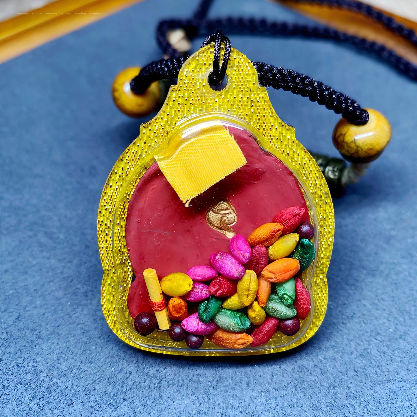 Tibetan Buddhist Jewelry Culture Tibetan Buddhist Yellow Jambhala multicolor Tsa Tsa amulet pendant, handcrafted mineral pigment Jewelry art necklace