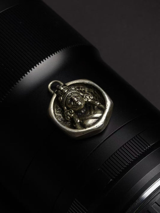 Zaki Lhamo guardian pendant inspired by Tibetan Buddhist jewelry culture, worn for love, protection, and inner harmony.