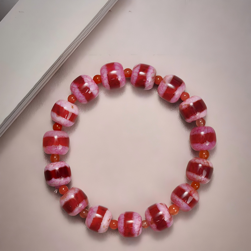 “Zhoma La Dzi Beads Bracelet, Tibetan handmade red agate bracelet, unisex spiritual accessory for wealth, luck, and positive energy.”
