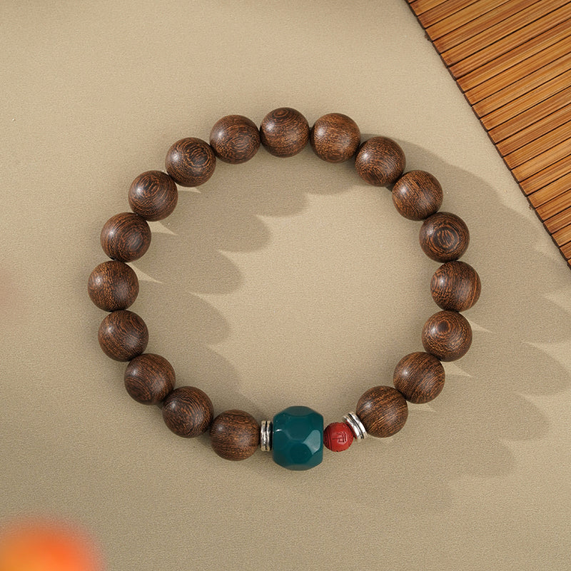 Handcrafted Tibetan Buddhist meditation mala, made of golden silk nanmu wood, cinnabar and glass. This genuine rosary is hand-ved by craftsmen using traditional Tibetan jewelry art techniques. The golden silk nanmu wood, protective cinnabar beads and glass in the mala create powerful spiritual energy for daily and Buddhist practice. This is a meaningful piece of Tibetan Buddhist jewelry culture.