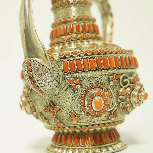 Pure silver coral water vessel for Tibetan Buddhist rituals, handcrafted under Tibetan Buddhist ritual implements culture as ceremonial Buddhist ritual implements art.
