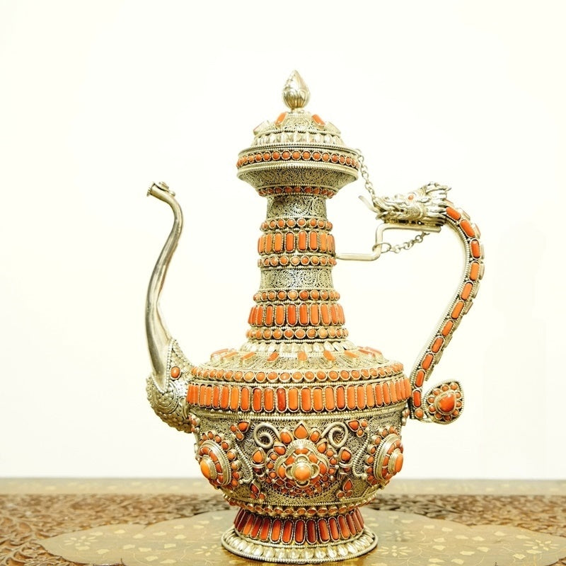 Handcrafted pure silver coral neti water pot used in Tibetan Buddhist purification practice, inspired by Tibetan Buddhist ritual implements culture and Buddhist ritual implements art.