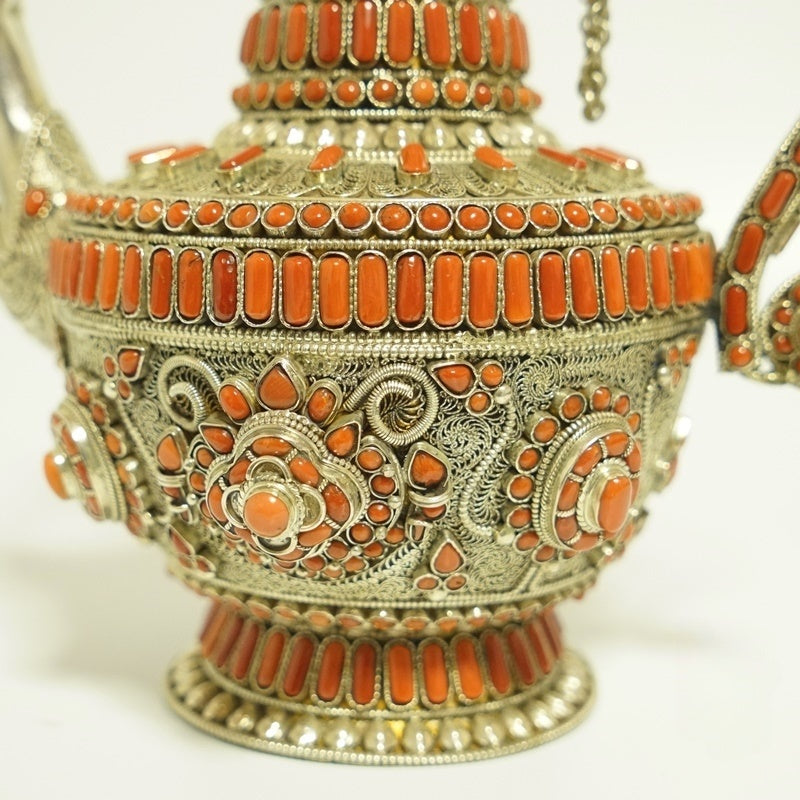 Ritual pure silver coral water pot for altar use, handmade within Tibetan Buddhist ritual implements culture and valued as Buddhist ritual implements art.