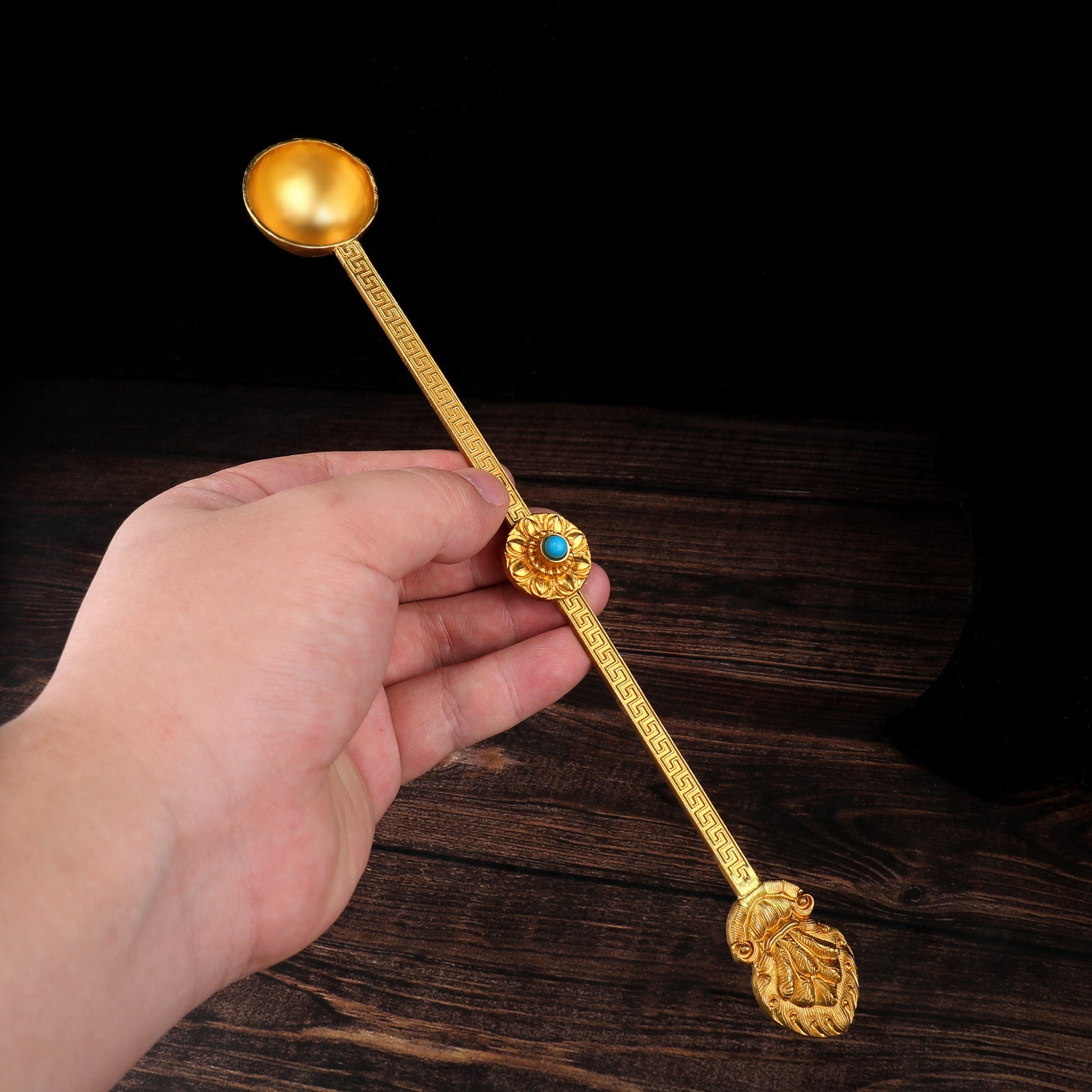 Traditional homam fire offering spoon made of brass, handcrafted Tibetan Buddhist ritual implement reflecting sacred ritual art