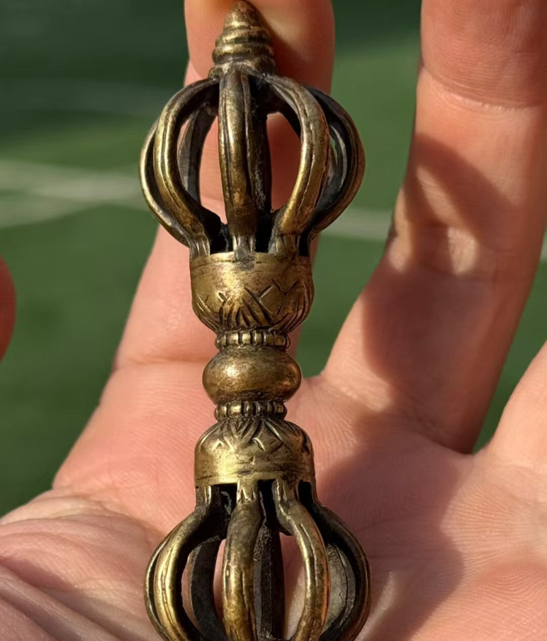 This Tibetan Buddhist Vajra ritual tool is meticulously handcrafted from brass, representing powerful spiritual strength and wisdom. It embodies Tibetan Buddhist ritual implements culture and makes a perfect piece for collection or meditation.