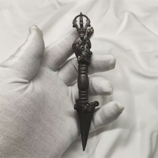 Handcrafted 15cm brass Phurba, a Tibetan Buddhist ritual implement used for purification and protection in East Tibetan rituals, symbolizing spiritual strength.