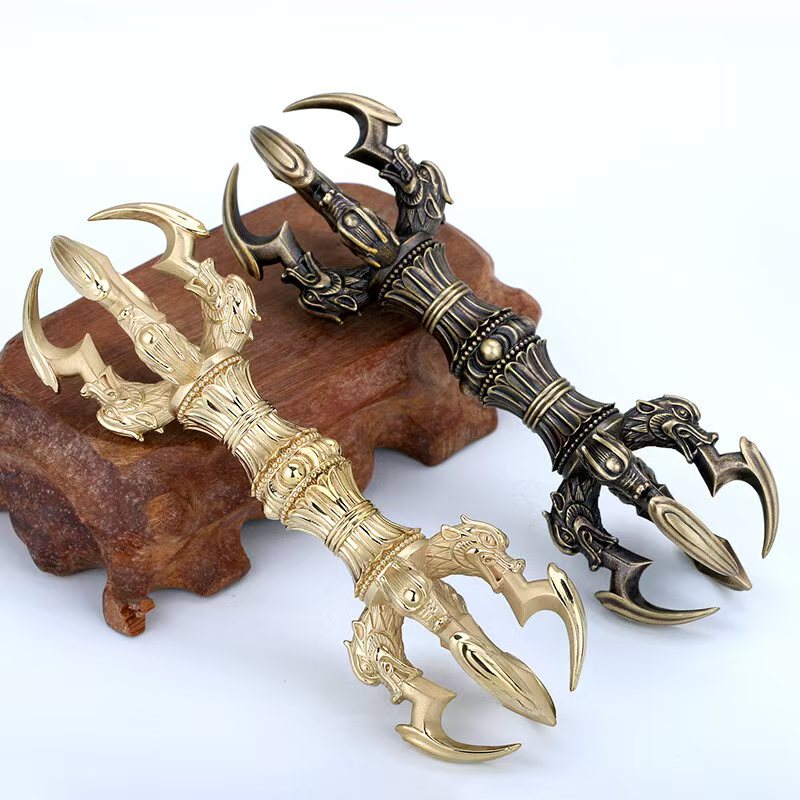 Brass Five-Prong Vajra handle, handcrafted with Tibetan Buddhist ritual art. A powerful symbol of spiritual strength and protection, ideal for meditation and rituals