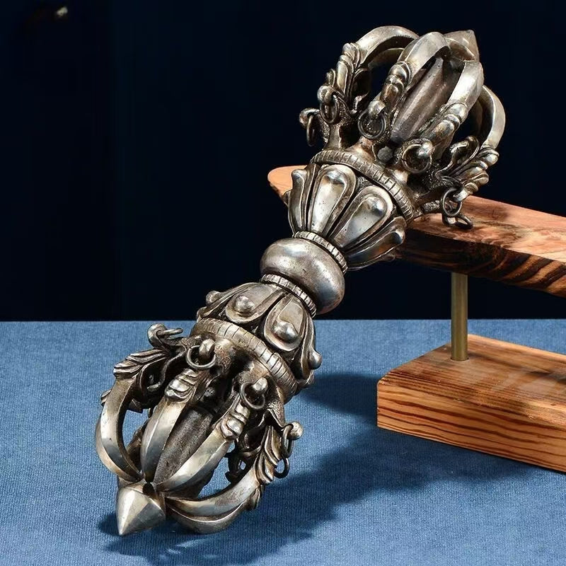 Brass Five-Pronged Vajra Bell, handcrafted with antique copper finish and intricate floral carvings. Ideal for rituals, Buddhist altars, and creating a harmonious spiritual environment