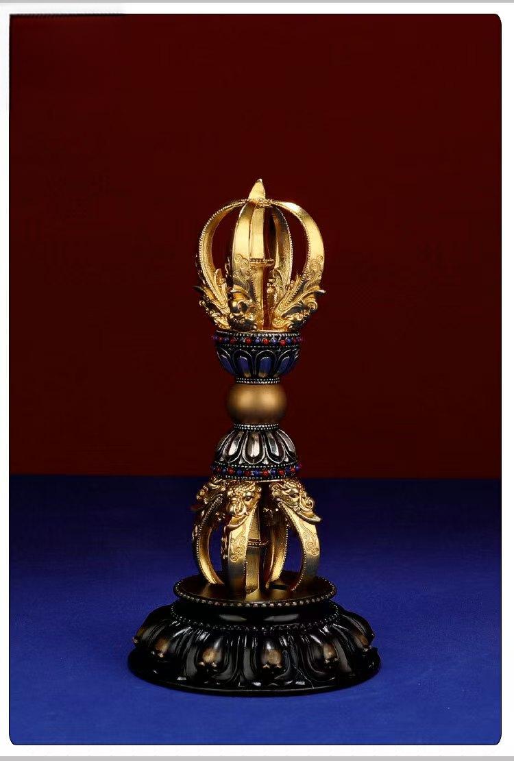 This beautiful Brass Five-Pronged Vajra sculpture is a true representation of Tibetan Buddhist craftsmanship. It symbolizes spiritual protection and the removal of negativity. Ideal for meditation spaces, Buddhist altars, or as a decorative art piece, it brings both aesthetic beauty and powerful spiritual energy into your environment.