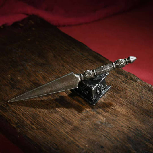 Handcrafted brass Phurba Vajra with base inspired by Tibetan Buddhist ritual implements culture, representing wrathful protection and Buddhist ritual implements art.