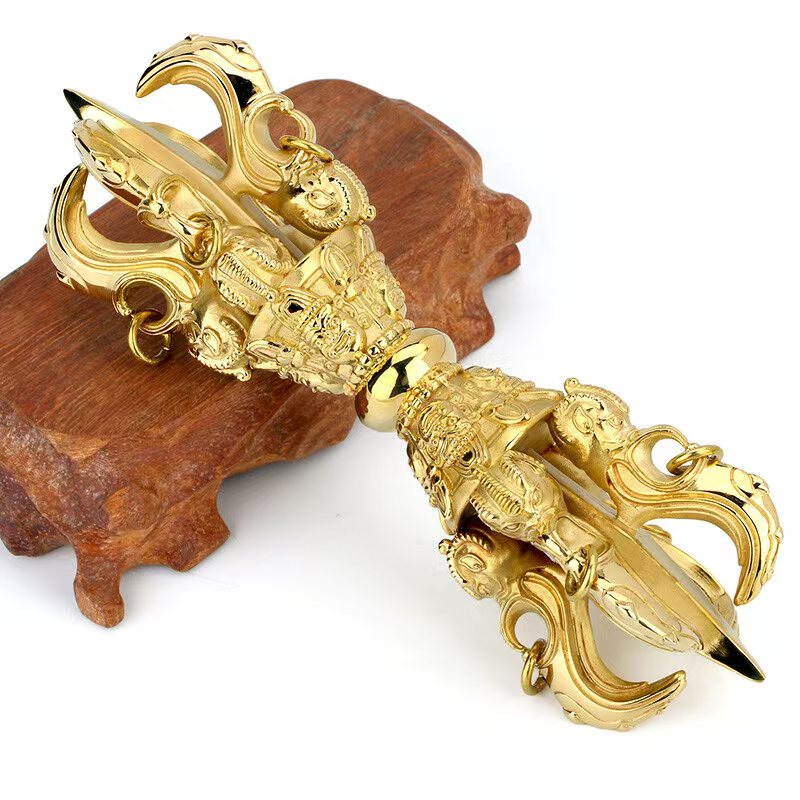 Handcrafted Brass Vajra with Lotus Master design, representing Tibetan Buddhist ritual implements art. A sacred tool for meditation, rituals, and enhancing the spiritual atmosphere of your home