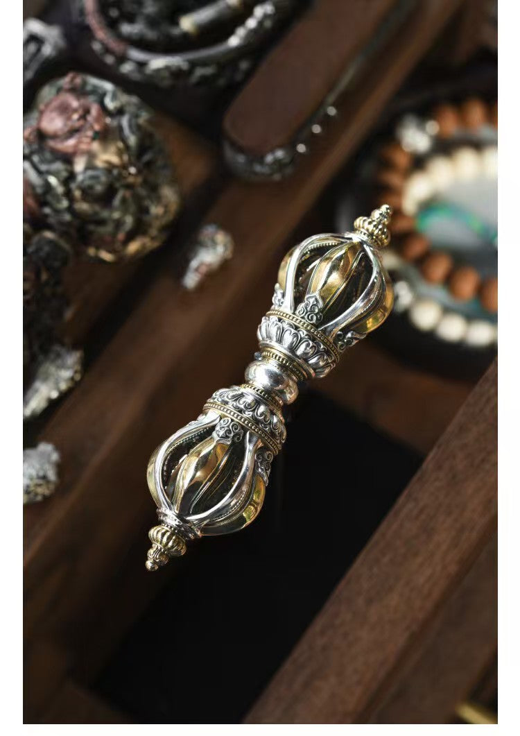 Brass Nine-Prong Demon-Subduing Vajra, handcrafted with Tibetan Buddhist ritual art. A powerful symbol of wisdom and protection, ideal for rituals and spiritual practices."