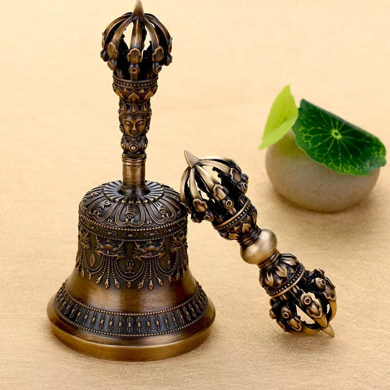 Brass Nine-Pronged Vajra Bell, handcrafted as a spiritual tool for rituals and meditation. Symbolizing wisdom, protection, and spiritual mastery in Tibetan Buddhism.