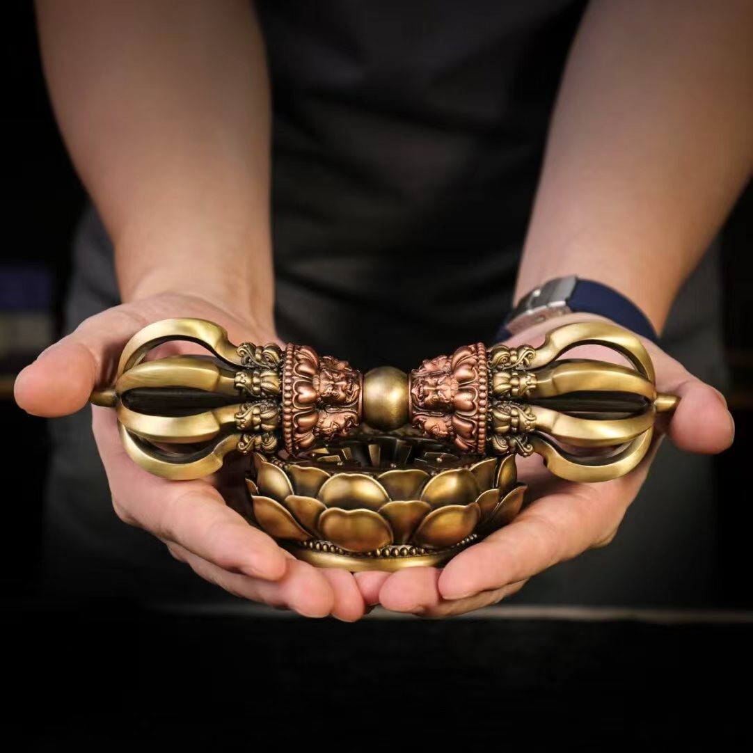 Brass Nine-Pronged Vajra, a demonic slayer ritual tool. Ideal for Tibetan Buddhist rituals, providing protection and spiritual cleansing in sacred environments.