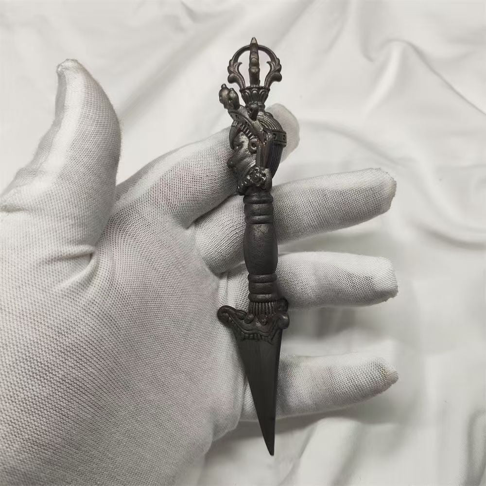 Brass 15cm Phurba, handcrafted to cut through negative energy, a powerful tool for Tibetan Buddhist rituals and spiritual purification, designed for ritual practitioners.