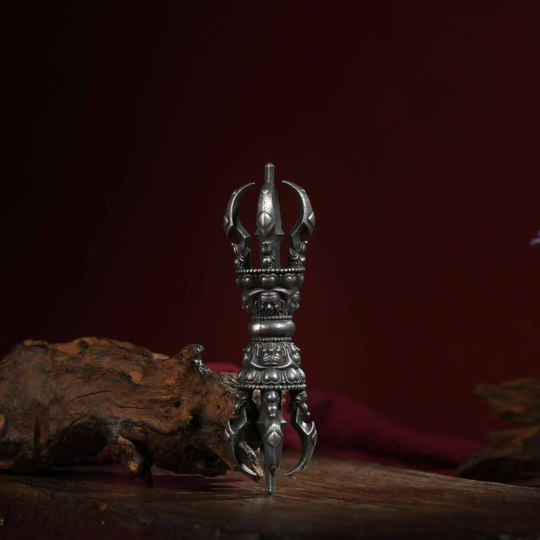 Handcrafted Brass Phurba Vajra, symbolizing the essence of Nirvana in Tibetan Buddhist ritual culture. A powerful tool for spiritual protection and enlightenment, perfect for altars and meditation spaces.