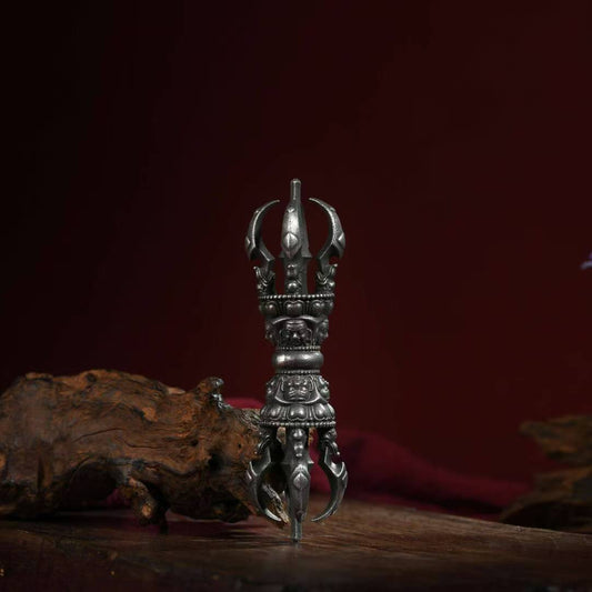 Handcrafted Brass Phurba Vajra, symbolizing the essence of Nirvana in Tibetan Buddhist ritual culture. A powerful tool for spiritual protection and enlightenment, perfect for altars and meditation spaces.