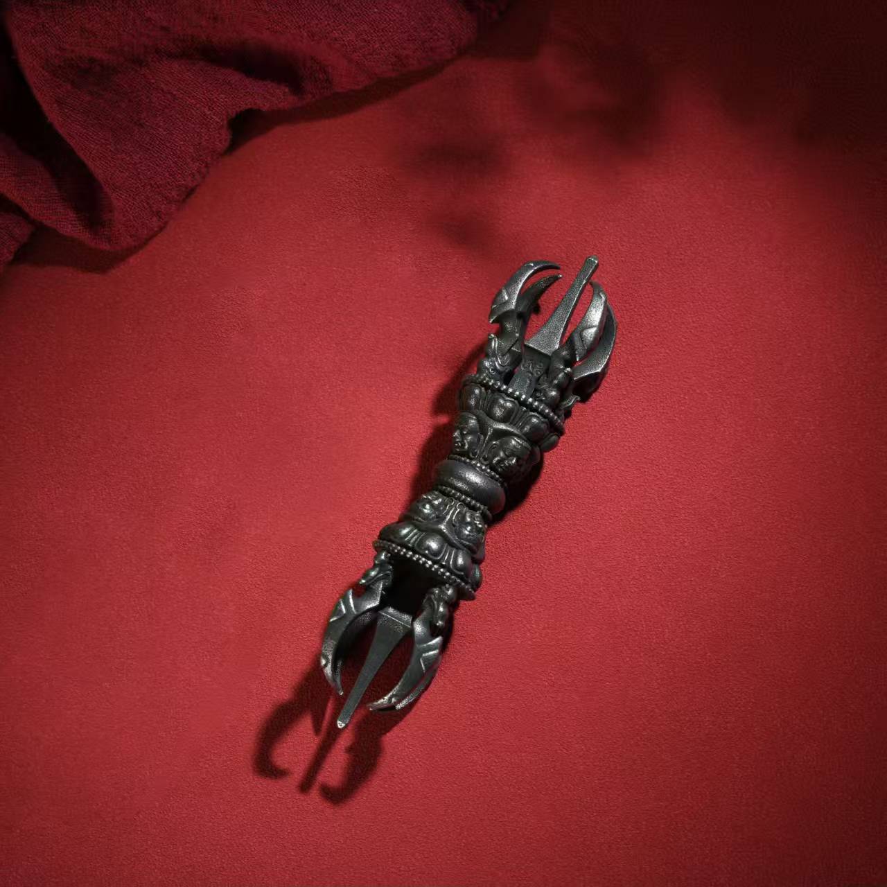 Brass Phurba Vajra with intricate lotus design, representing the sacred art of Tibetan Buddhist rituals. A symbol of peace, purity, and spiritual protection, ideal for meditation and spiritual practice.