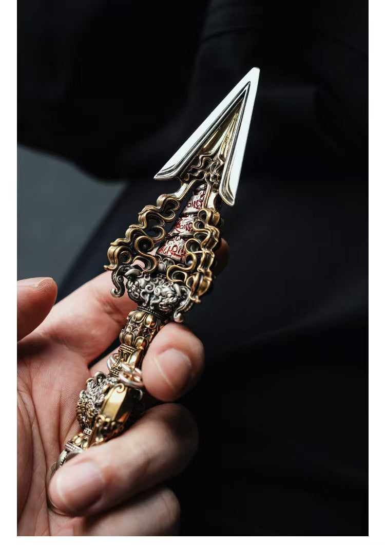 Exquisite handmade brass Vajra Phurba, showcasing Tibetan Buddhist ritual art. A decorative piece for spiritual spaces or as a unique collectible item.