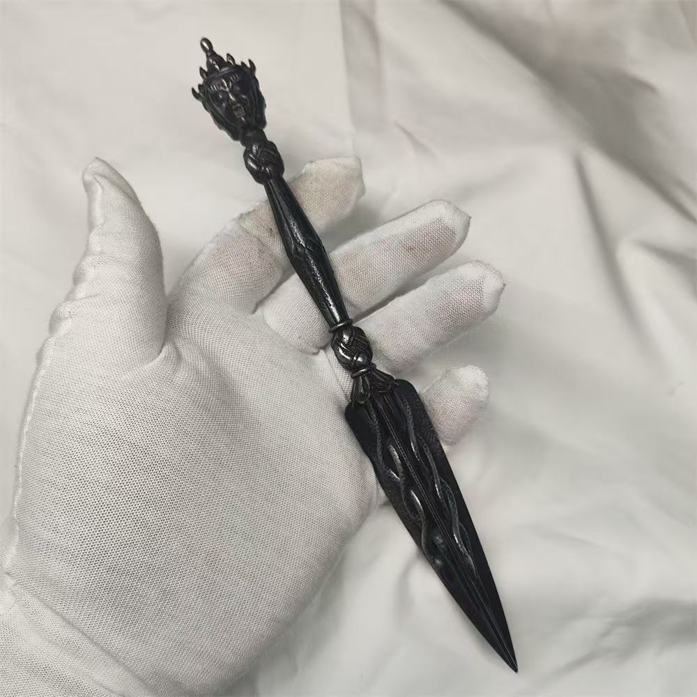 Handcrafted brass Tian Tie Phurba, featuring a three-sided design, inspired by Tibetan Buddhist ritual implements culture, symbolizing protection, purification, and spiritual transformation.