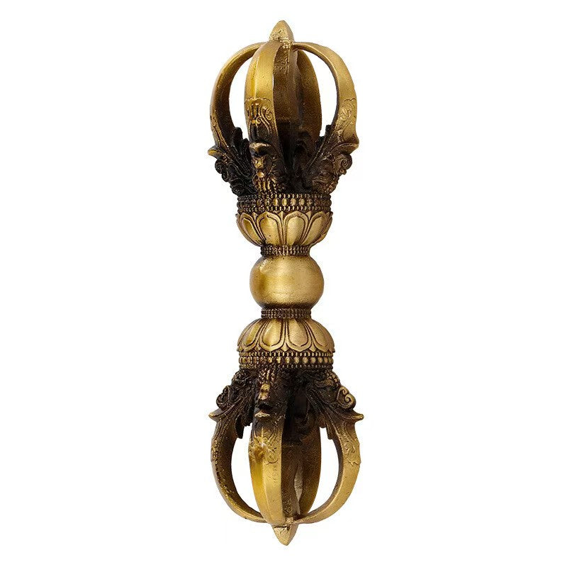 Handcrafted brass Vajra from Tibetan Buddhist ritual implements culture, symbolizing wisdom and spiritual power in traditional Buddhist ritual art.