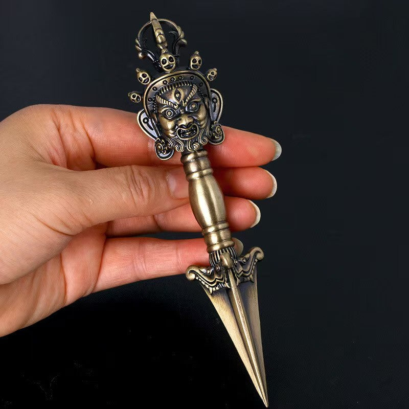Handcrafted brass Wrathful Vajra from Tibetan Buddhist ritual implements culture, powerful Buddhist ritual implements art symbolizing protection and spiritual strength.