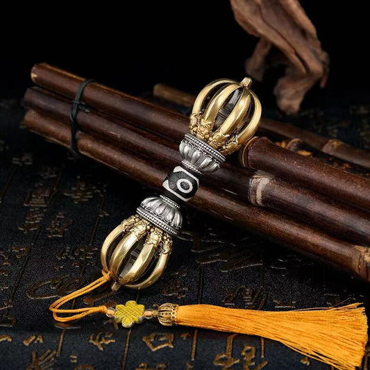 Handcrafted nine-pronged Vajra Phurba made from brass, symbolizing protection and spiritual power. A perfect Tibetan Buddhist ritual piece for your home or collection, blending tradition and artistry.