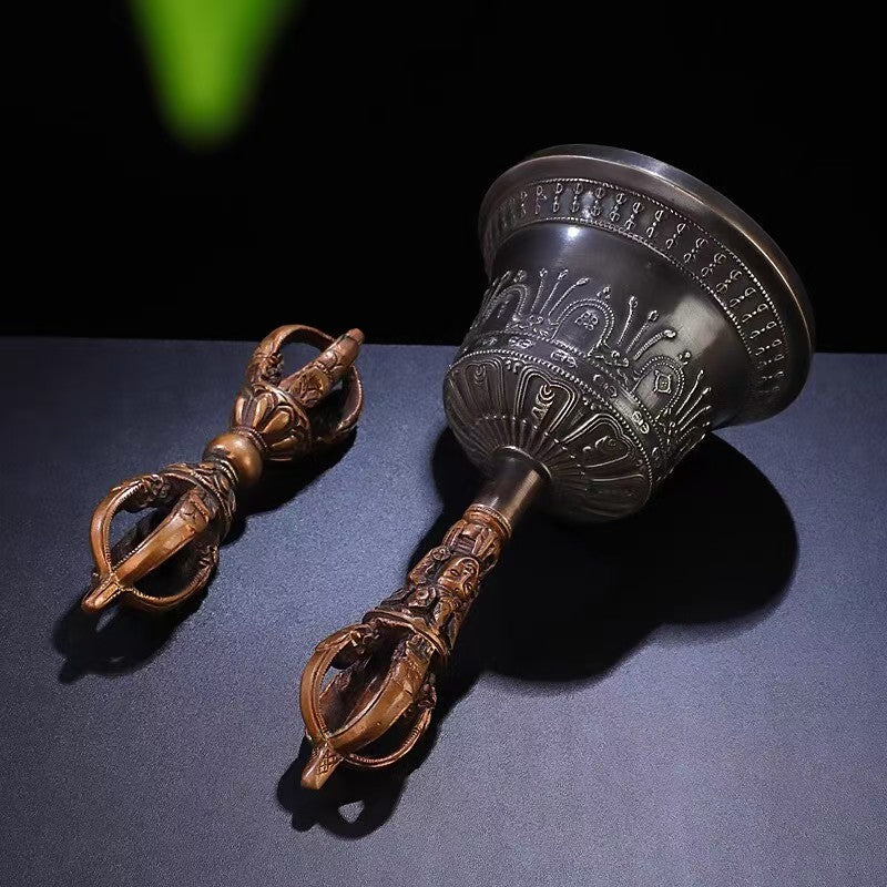 This Nepalese-style five-pronged Vajra bell is crafted from high-quality brass, hand-finished to perfection, beautifully reflecting the traditional craftsmanship and spiritual significance of Tibetan Buddhist ritual art.
