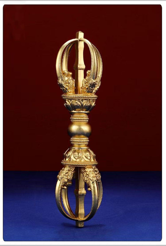 This Brass Five-Pronged Vajra ornament is handcrafted with great attention to detail. It serves as both a functional ritual tool and a decorative piece, symbolizing protection and purification in Tibetan Buddhist culture. Place it on your altar or meditation space to invite positive energy and spiritual harmony.