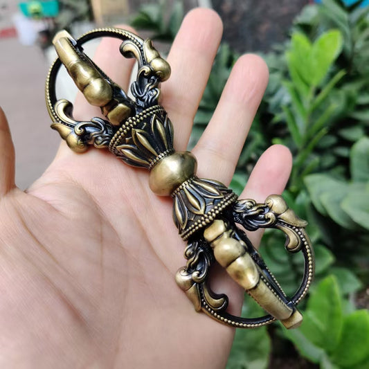 Brass Five-Pronged Vajra handle, handcrafted as a sacred ritual tool representing spiritual energy, protection, and purification. Perfect for Tibetan Buddhist altars, meditation spaces, and ritual practices.