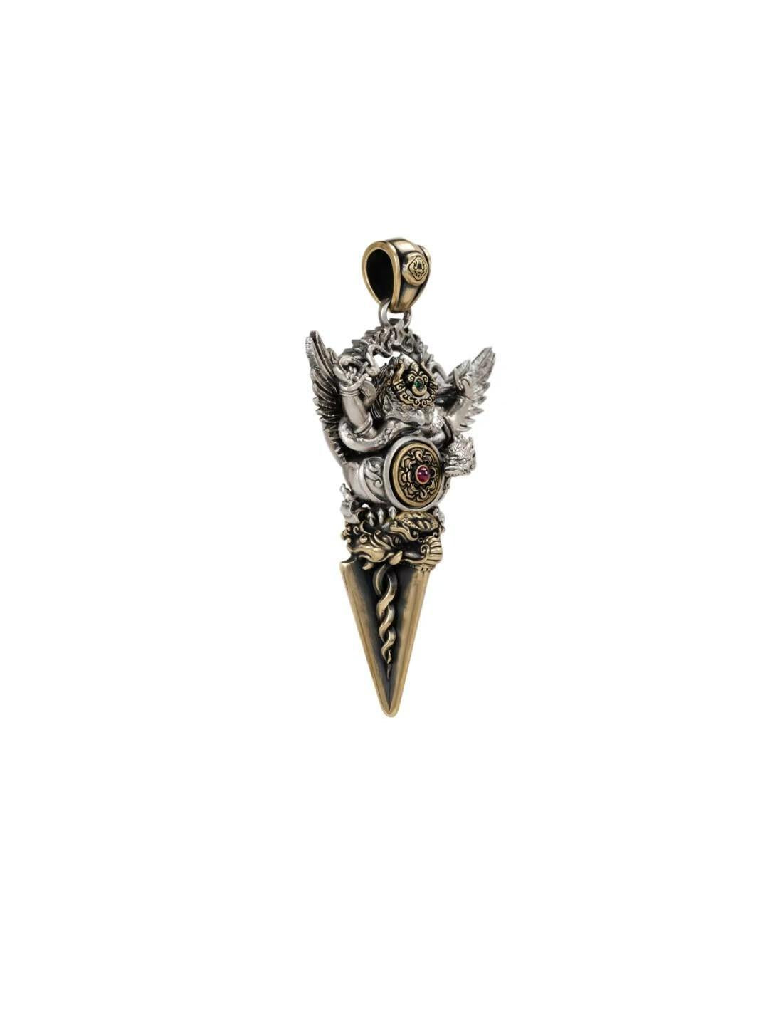 A beautifully handcrafted brass Garuda pendant, symbolizing divine protection and strength. This vintage-style piece combines spiritual meaning with timeless fashion, perfect for everyday wear or as part of a ritual collection.