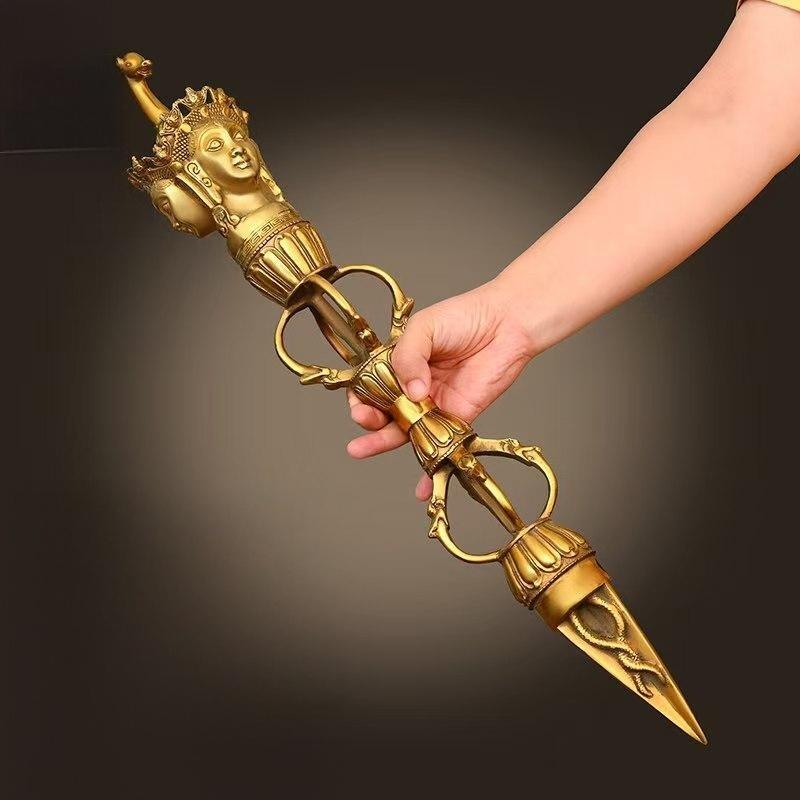 This handcrafted brass Mahakala Phurba Vajra, designed with Chinese style elements, symbolizes protection and strength. Ideal for Buddhist rituals, meditation, or as a powerful spiritual tool for personal practice.