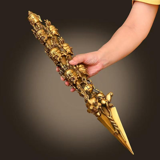 This large handcrafted brass Mahakala Phurba Vajra features a traditional design with a Chinese-style influence, symbolizing the power to drive away evil and protect the Dharma. Its fine craftsmanship and deep symbolism make it an essential tool for Buddhist practitioners and spiritual seekers.