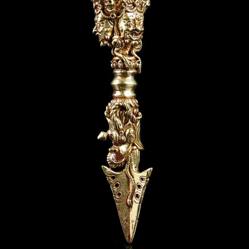 Exquisite brass Mahakala Vajra featuring traditional Tibetan craftsmanship. A powerful symbol of spiritual protection and wisdom, ideal for use in rituals or as a unique decorative piece.